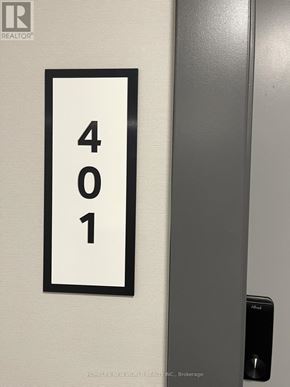 Toronto (Dovercourt-Wallace Emerson-Junction) condo for rent - A door with a sign that says 401 on it.