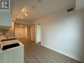 Toronto (Church-Yonge Corridor) condo for rent - A kitchen area with a sink and a countertop.