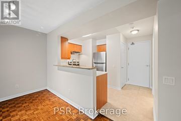 Toronto (Lawrence Park South) condo for rent - A kitchen area with a counter and cabinets is visible.