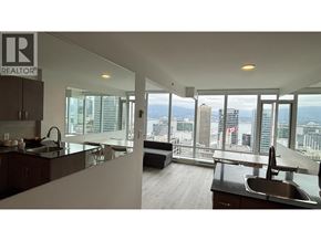 Vancouver apartment for rent - A realtor's office with a view of the city.