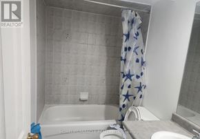 Brampton (Fletcher's Creek South) apartment for rent - A bathroom with a shower curtain that has blue stars on it.