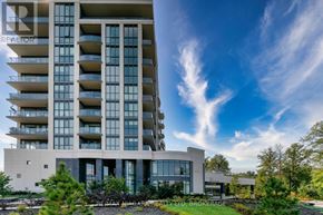 Niagara Falls (Oldfield) condo for rent - A modern building with a glass facade and a sign that reads "REALTOR".