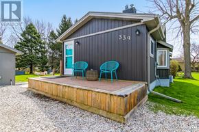 Central Elgin (Port Stanley) apartment for rent - A house numbered 339 has a deck with two chairs.