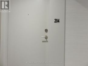 Brampton (Northwest Brampton) condo for rent - A white door with the number 204 on it.