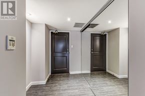 Toronto (Church-Yonge Corridor) condo for rent - A hallway with two doors and a sign that says REALTOR.