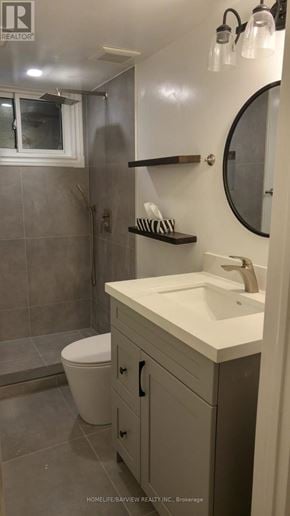 Markham (Grandview) apartment for rent - A bathroom with a toilet, sink, and mirror.