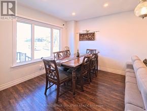 Toronto (O'connor-Parkview) apartment for rent - A dining room with a wooden table and chairs.