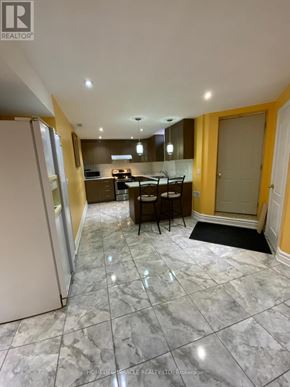 Caledon apartment for rent - A kitchen with a dining table and chairs.