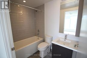 Toronto (Kensington-Chinatown) condo for rent - A bathroom with a toilet, sink, and bathtub.