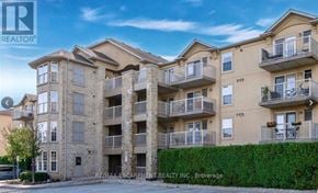 Burlington (Palmer) condo for rent - A building with balconies and a sign that says RE/MAX Escarpment Realty Inc. Brokerage.