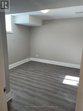 Vaughan (Kleinburg) apartment for rent - A room with grey carpeting and white walls.