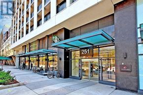 Toronto (Church-Yonge Corridor) condo for rent - The building number 251 has a green awning.
