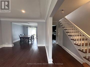 Ottawa apartment for rent - A dining room with a table and chairs is shown in the image.