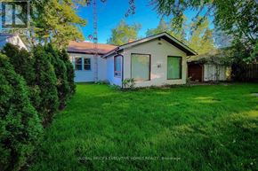 Welland (N. Welland) apartment for rent - A house with a green lawn in front of it.