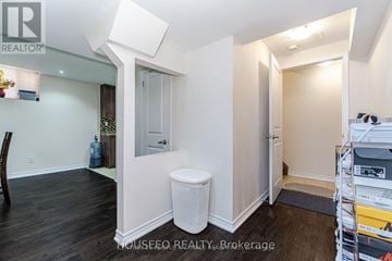 Brampton (Credit Valley) apartment for rent - A white toilet sits in a small, empty room.