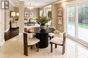 Newmarket (Stonehaven-Wyndham) apartment for rent - A dining room with a table and chairs.