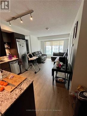 Toronto (Islington-City Centre West) condo for rent - A kitchen with a cutting board on the counter.