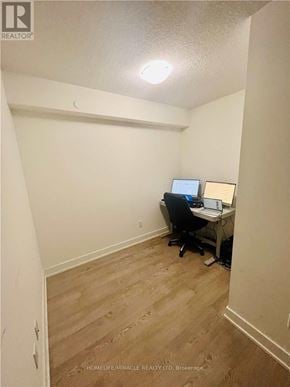 Toronto (Islington-City Centre West) condo for rent - A small office with a desk and a laptop.