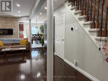 Mississauga (Lisgar) apartment for rent - A living room with a couch and a fireplace.