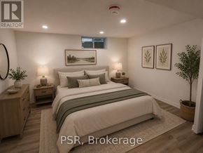 Toronto (Forest Hill South) fourplex for rent - A bedroom with a large bed, nightstands, and a plant.