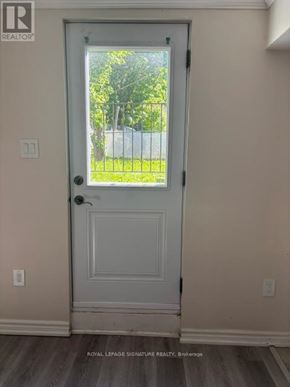 Mississauga (Erindale) apartment for rent - A white door with a glass window in the middle.