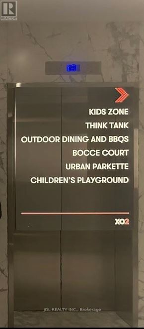Toronto (South Parkdale) condo for rent - A sign with various options such as Kids Zone, Outdoor Dining and BBQs, and Children's Playground.