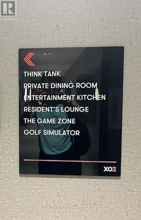 Toronto (South Parkdale) condo for rent - A sign lists amenities such as a private dining room and a game zone.