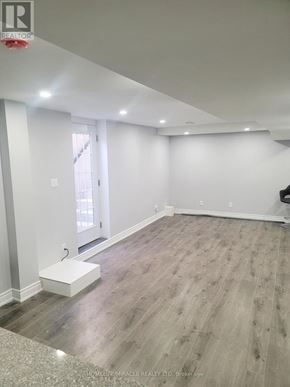 Markham (Rouge Fairways) apartment for rent - A room with wooden flooring and white walls.