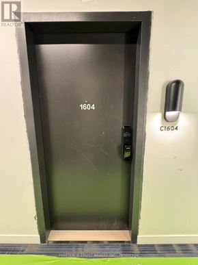 Burlington (Alton) condo for rent - A door with the number 1604 on it.