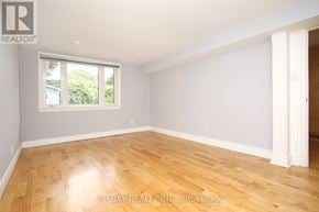 Toronto (Willowdale West) apartment for rent - A room with wooden flooring and a window.