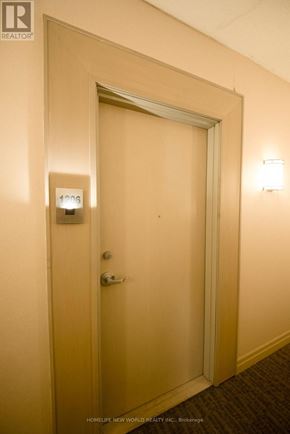 Toronto (Willowdale East) condo for rent - A door with a handle and a lock on it.