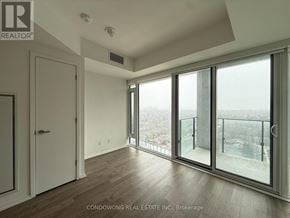 Toronto (Mount Pleasant East) condo for rent - A room with a view of the city from a balcony.