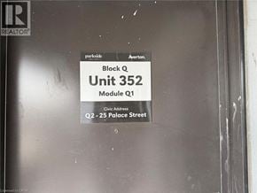 Kitchener townhouse for rent - A sign on a door that says Block Q Unit 352.