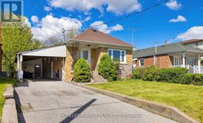 Toronto (Wexford-Maryvale) apartment for rent - A house with a driveway and a garage is for sale.