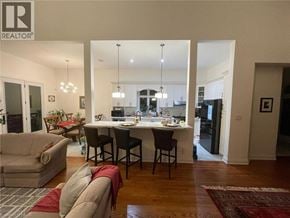 Hamilton apartment for rent - A well-lit dining area with a table set for four.