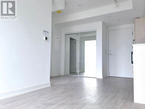 Toronto (Church-Yonge Corridor) condo for rent - A white room with a doorway leading to another room.