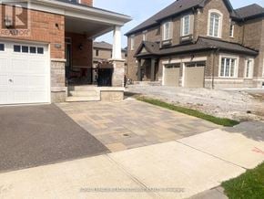 Milton (Cb Cobban) apartment for rent - A house with a garage in front of it.