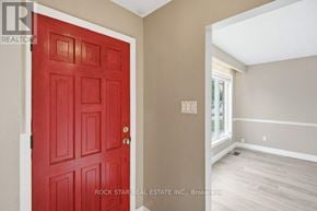 Hamilton (Vincent) apartment for rent - A red door is on the left and a white door is on the right.