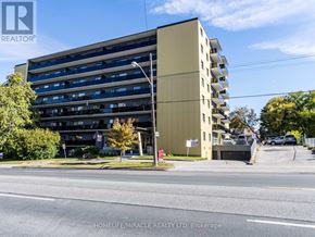Toronto (Wexford-Maryvale) multi-family for rent - A building with the sign "HOMELIFE/MIRACLE REALTY LTD, Brokerage" in front of it.