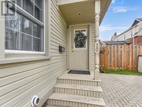 Brockville apartment for rent - A house numbered 20 with a wreath on the door.
