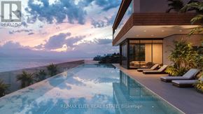 Oakville (Wm Westmount) condo for rent - A modern house with a pool and lounge chairs.
