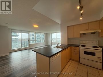 Markham (Commerce Valley) condo for rent - A kitchen with a stove and a countertop.