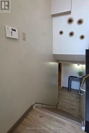 Vaughan (West Woodbridge) apartment for rent - A white wall with a thermostat and four lights on it.