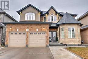 Hamilton (Stoney Creek) apartment for rent - A large house with a garage is for sale.