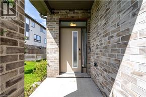 London townhouse for rent - A realtor's photo of a house entrance.