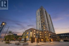 Kitchener condo for rent - A tall building with the number 5 on it is in the foreground.