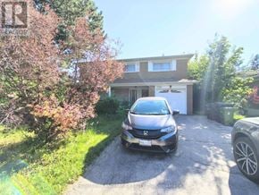 Toronto (Don Valley Village) apartment for rent - A Honda car is parked in front of a house.