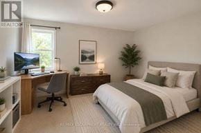 Hamilton (Huntington) multi-family for rent - A bedroom with a bed, desk, and chair.