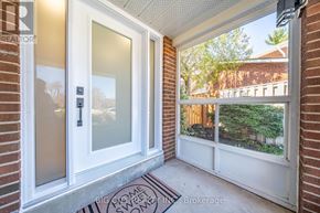 Toronto (L'amoreaux) apartment for rent - A white door with a glass window and a sign that says "BIG HOME SWEET HOME".