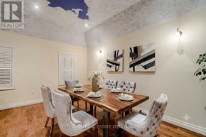 King (Nobleton) apartment for rent - A dining room with a wooden table and chairs.